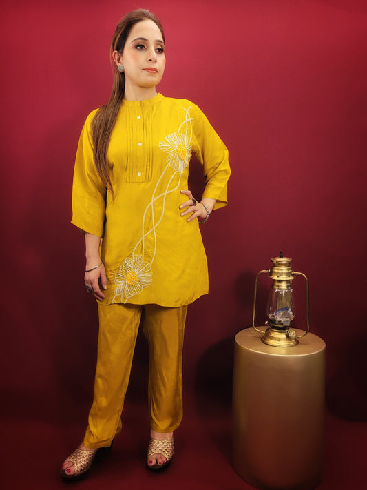 Crafted for comfort and style: This sunshine yellow co-ord set is made from breezy muslin fabric, keeping you cool and comfortable throughout the day. The intricate resham embroidery and delicate beadwork add a touch of elegance, making it perfect for various casual gatherings.  Effortlessly stylish: Look effortlessly chic at get-togethers with friends, family outings, or light evening parties. The versatile design allows you to dress it up or down depending on the occasion.