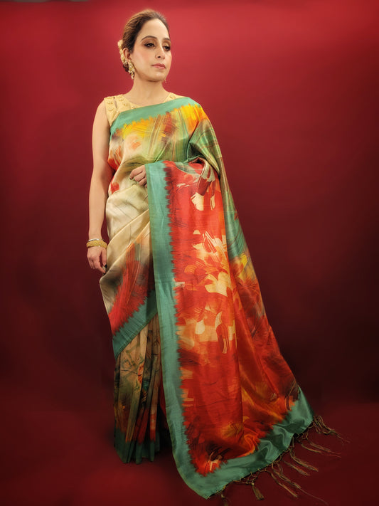 Drape yourself in the vibrant elegance of a multi-colored printed saree, crafted from the luxurious gitchi silk . perfect for any party or festive occasion.