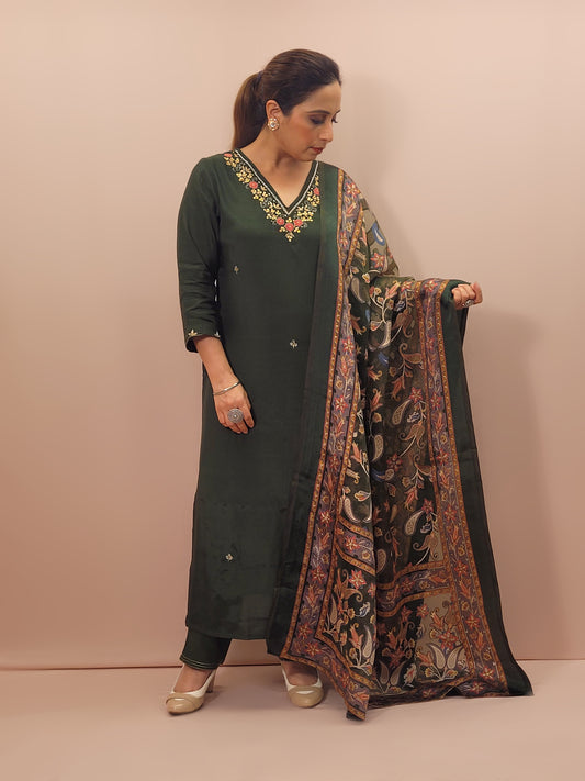 Muslin Green Suit with Designer multicolor Brasso Dupatta. Hand Embroidered Neckline using Resham, Dabka, and Beads.